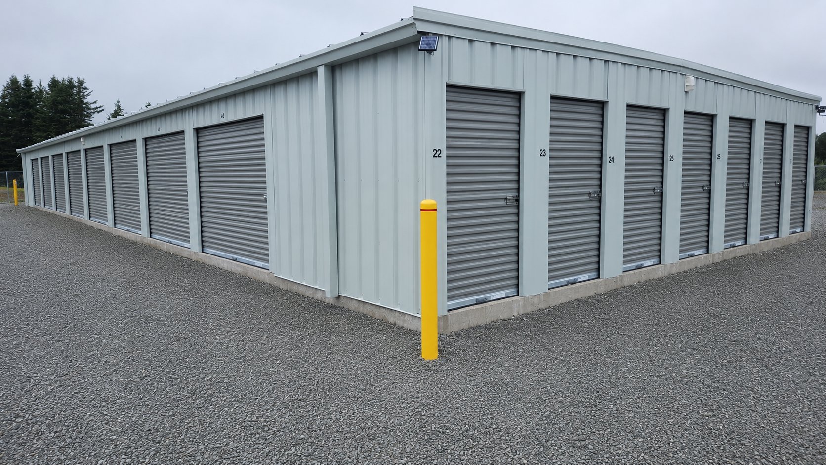 Close-up view of numbered drive-up storage units at the Boylston facility